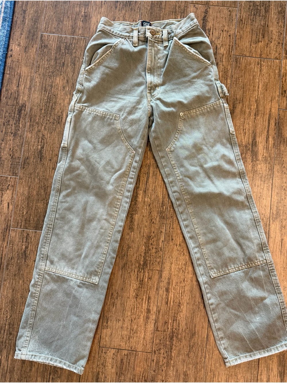 BDG high-waisted carpenter pants utility pockets and a faded cotton size 24